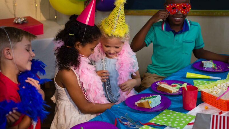 Children At Table During Party